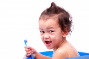 Baby And Toothbrush