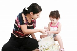 Mom Using Play Therapy to Teach Child Manners
