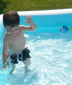 Child Playing in Wading Pool