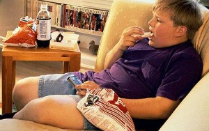 Childhood Obesity  Overweight Teenager Eating Junk Food