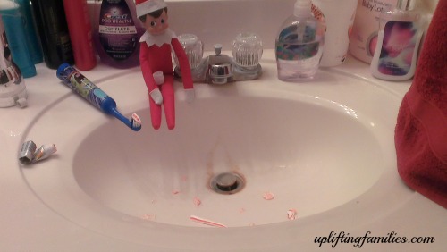 Rascal Elf on the Shelf Mess in Bathroom Sink