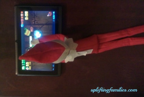 Rascal Elf on the Shelf Playing Fruit Ninja