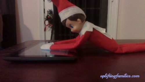 Rascal Elf on the Shelf Playing on The Tabelt