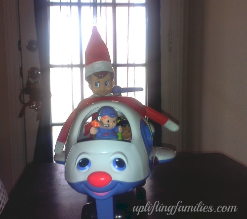 Rascal Elf on the Shelf Riding in Airplane